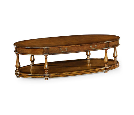 Large oval walnut coffee table