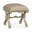 Heavily carved French provincial green x-frame footstool