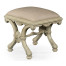 Heavily carved French provincial green x-frame footstool