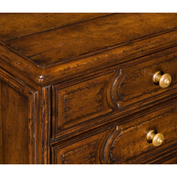 Tudor style walnut chest of four drawers