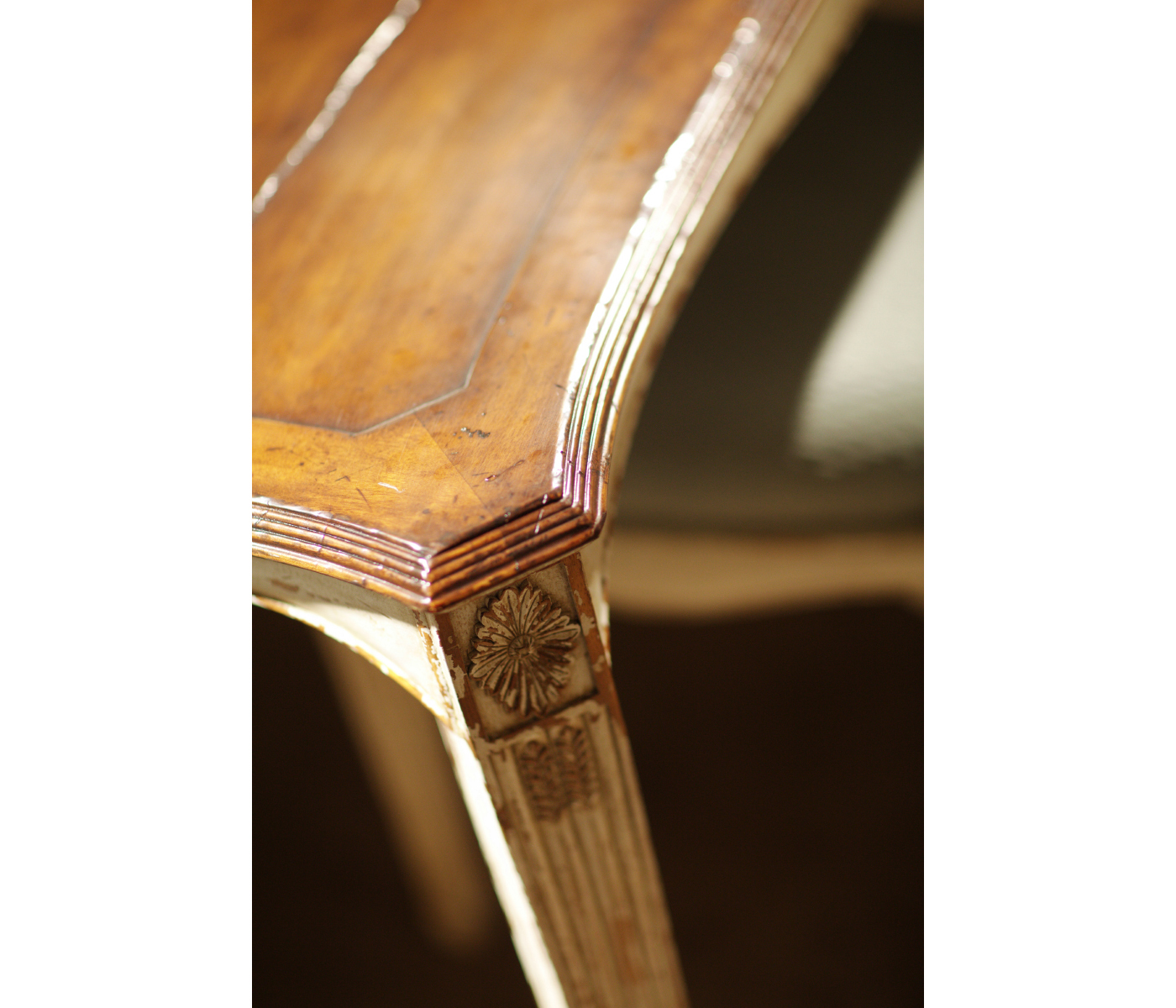 White rub-through dining table