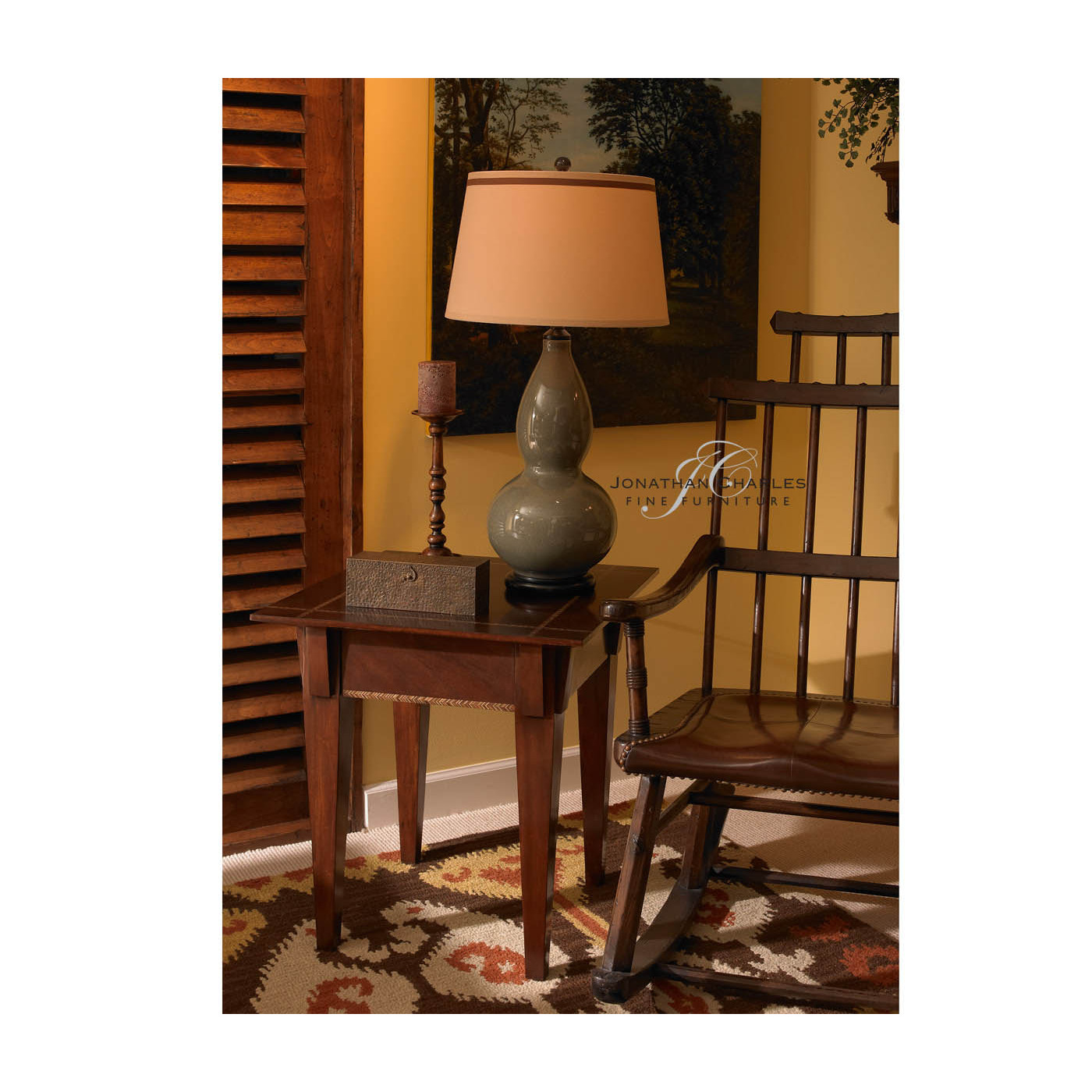 Dark Oak Windsor Style Rocking Arm Chair with A Studded Dark Antique Chestnut Leather Seat