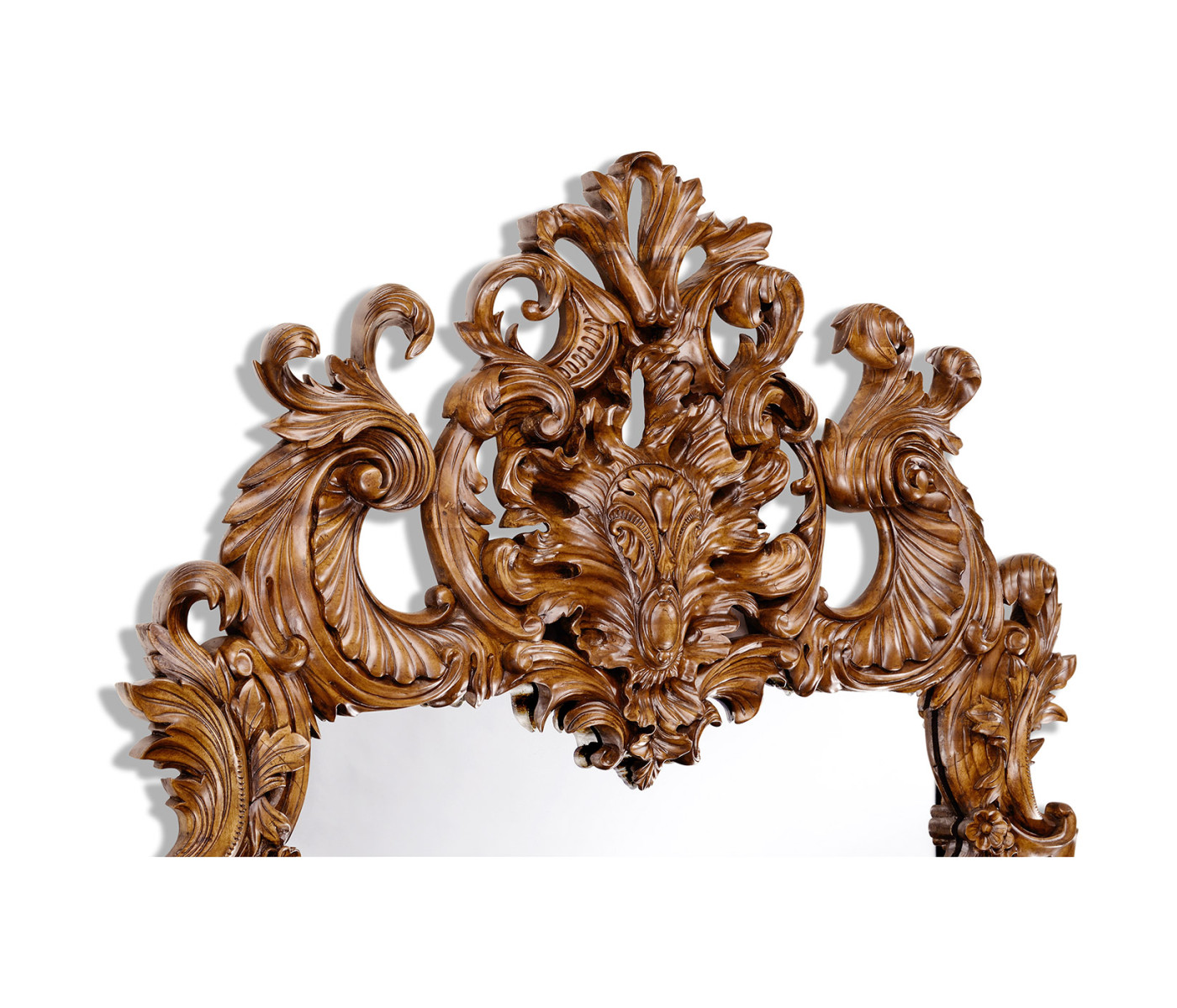 Finely carved walnut rococo style mirror