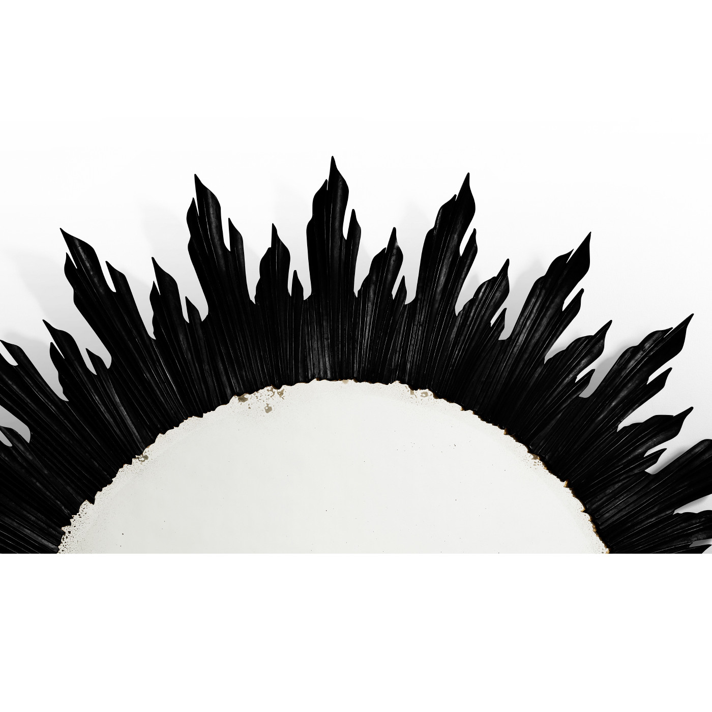 Large black sunburst mirror