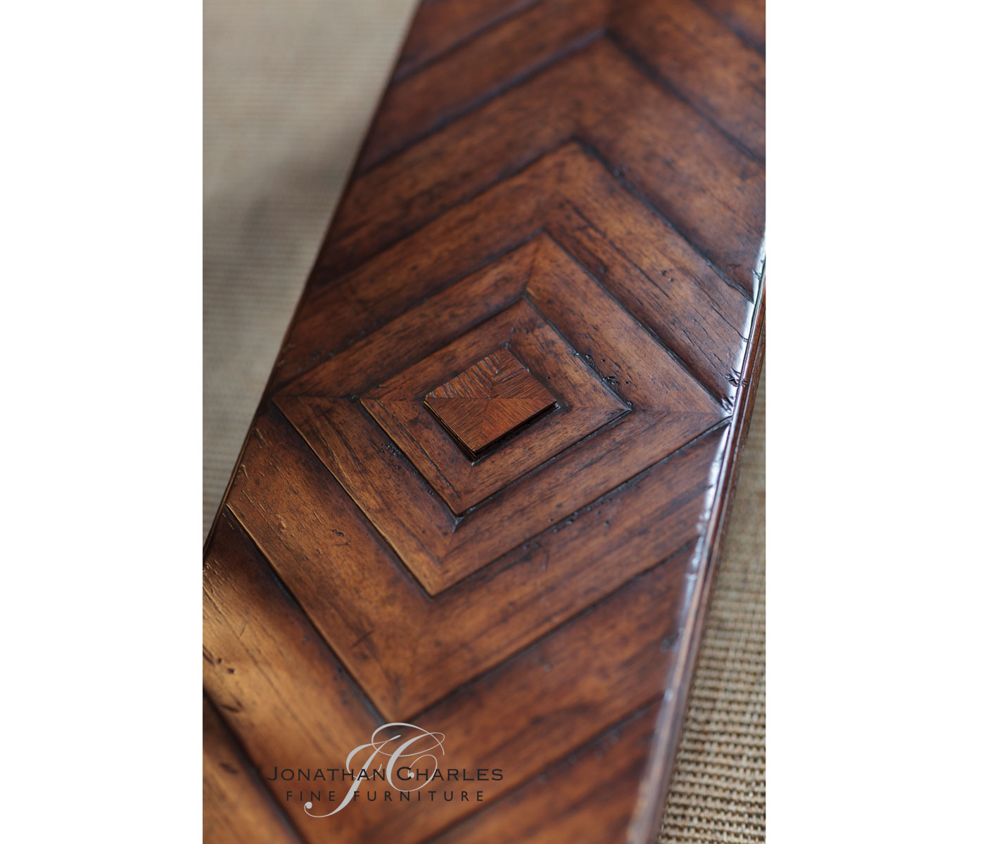 Heavily distressed parquet console with strap handles