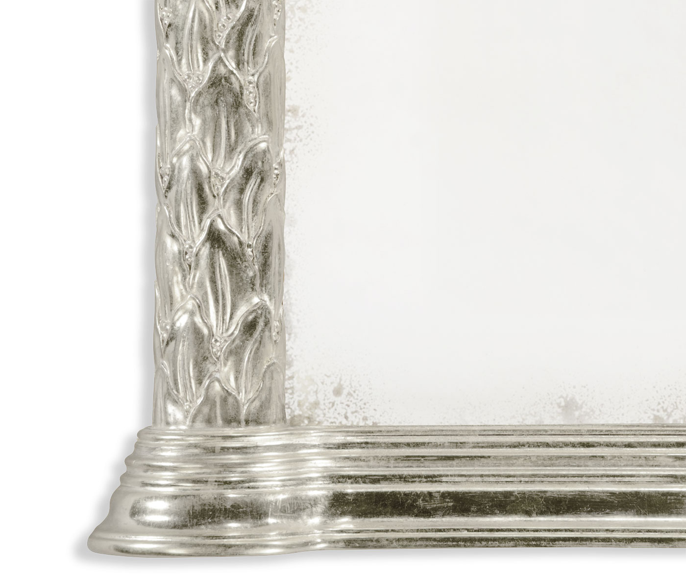 Carved and silver gilded hanging wall mirror